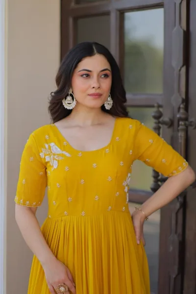 Elegant Yellow Embroidered Tiered Anarkali Gown with Flowy Flared Design